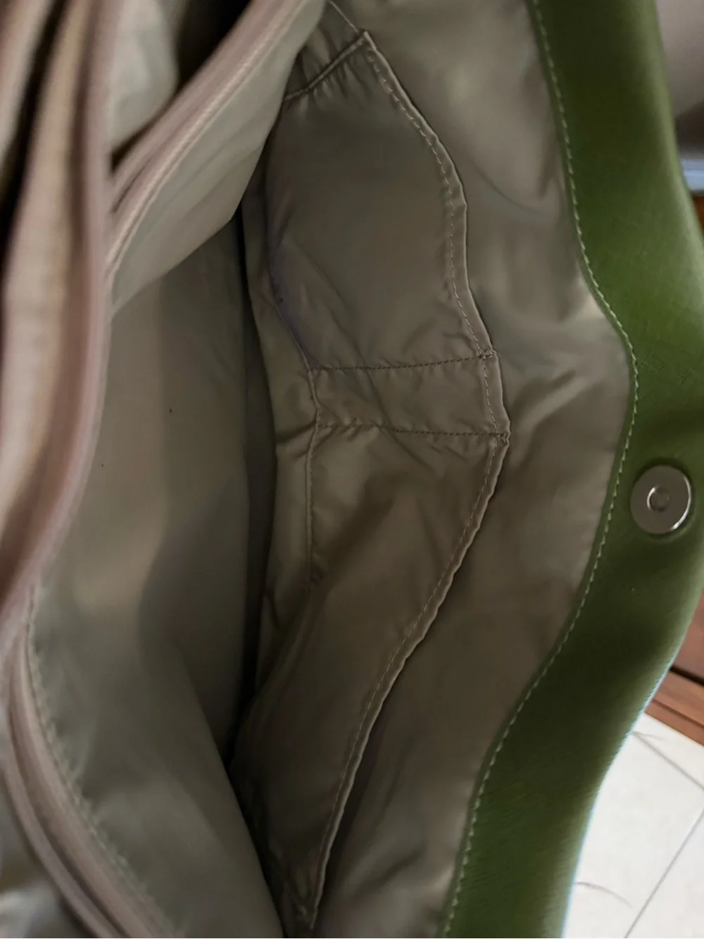 Tumi Green Tote with Tortoiseshell Tag, lots of pockets and laptop holder